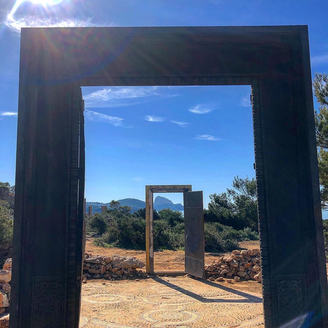A place on Ibiza, where nature meets art: Las Puertas de Can Soleil ☮️ In the perfect moment of the day you can see the sun shining through both of the doors with Es Vedra in the back – magic! #ibizamagic #cansoleil #cansoleilibiza #landart #instatravel #esvedra @es_vedra_ibz @landartforkids #instaart #nature #doors #puertas #magicplaces #ibizaspecialist #ibizadiary, Can Soleil